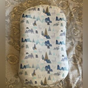 Snuggle Me Lounger with blue mountain cover